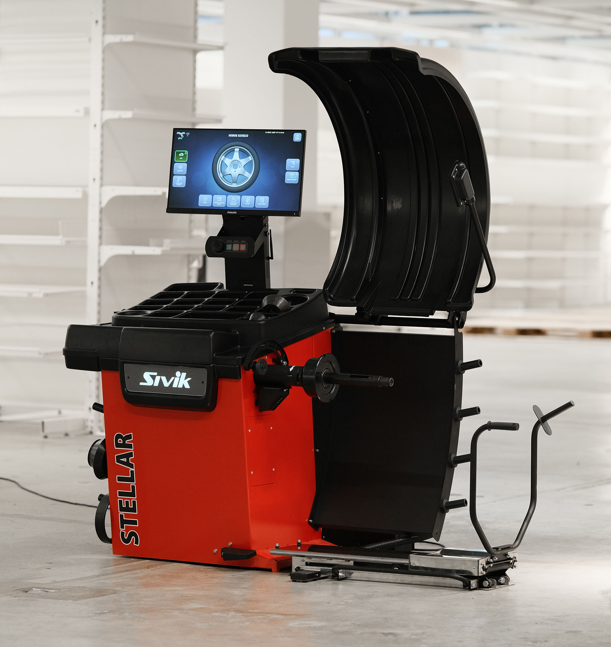 máy cân bằng lốp sivik stellar và thiết bị nâng lốp ks-239